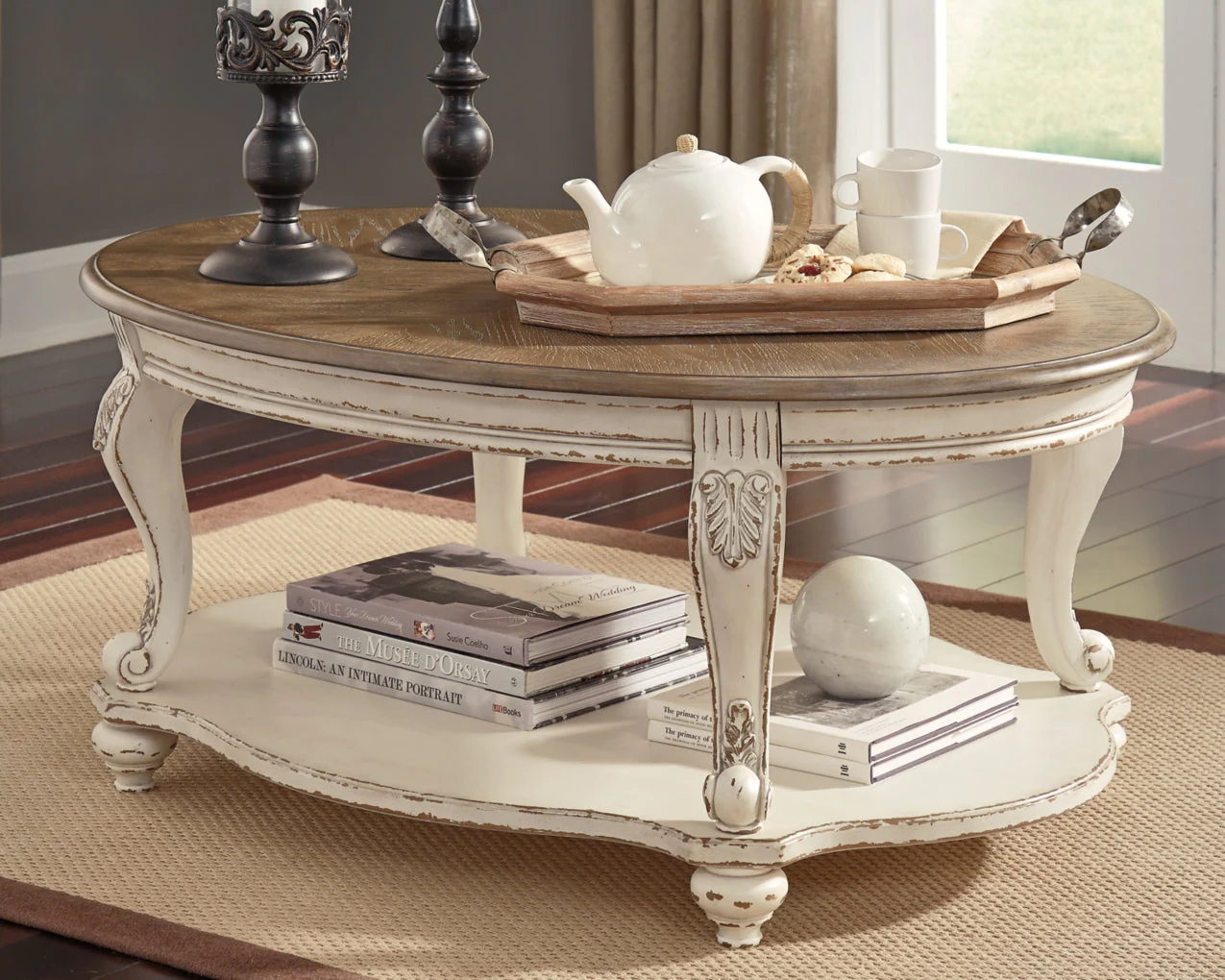 Realyn Oval Cocktail Table - Image 2